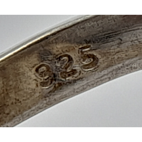 964 - A Vintage Modernist Design Moonstone Cabochon Ring, Size Q. The Ring is set with a very attractive c... 