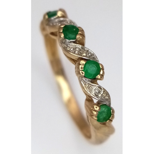 199 - A 9K GOLD RING WITH DIAMONDS AND EMERALDS .  2.1gms    size N