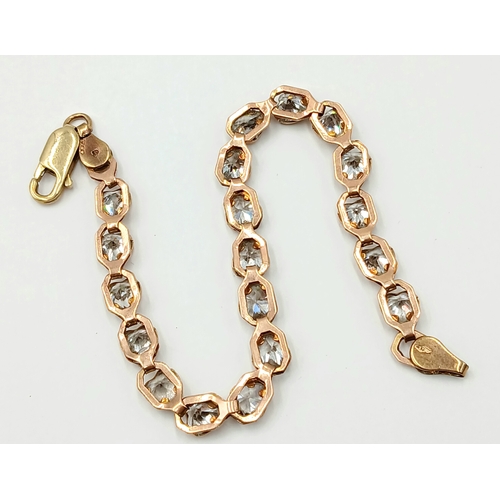 200 - A VERY PRETTY 9K GOLD BRACELET WITH HEARTS SHAPED CLEAR STONES .   9gms    20cms