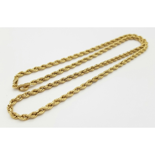 207 - A 9K GOLD TWIST LINK NECKLACE  .     2.4gms     40cms