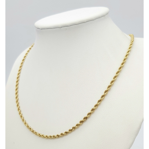 207 - A 9K GOLD TWIST LINK NECKLACE  .     2.4gms     40cms