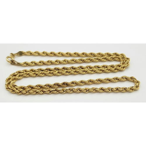207 - A 9K GOLD TWIST LINK NECKLACE  .     2.4gms     40cms