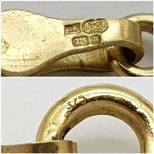 207 - A 9K GOLD TWIST LINK NECKLACE  .     2.4gms     40cms