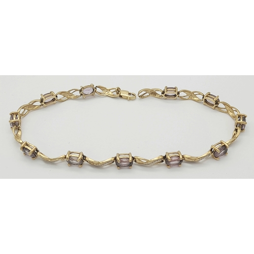 214 - A FABULOUS 9K GOLD AMETHYST 