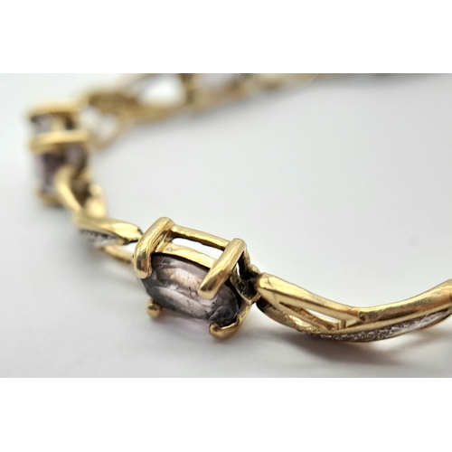 214 - A FABULOUS 9K GOLD AMETHYST 