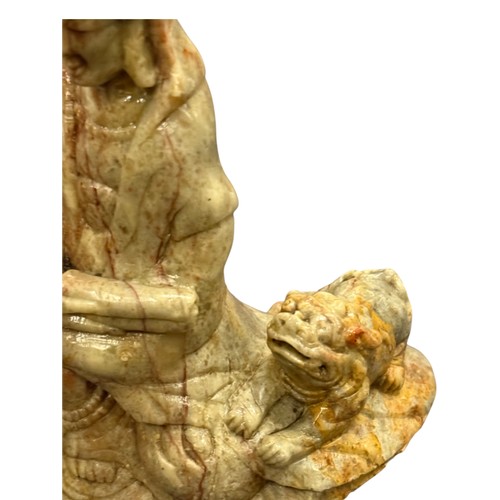 890 - Shoushan Stone Figure of Guanyin with Tiger，Height 13cm, Width at the base 10cm.
This piece is carve... 