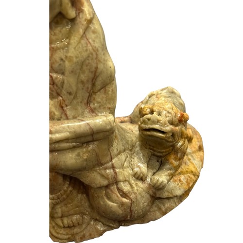 890 - Shoushan Stone Figure of Guanyin with Tiger，Height 13cm, Width at the base 10cm.
This piece is carve... 