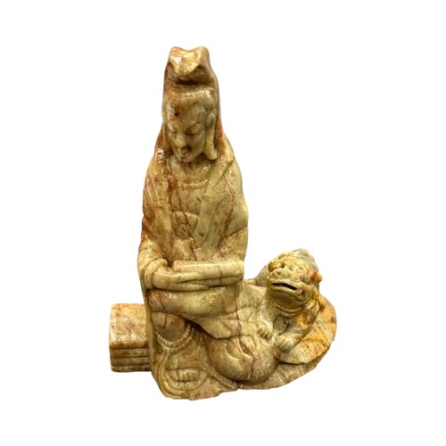 890 - Shoushan Stone Figure of Guanyin with Tiger，Height 13cm, Width at the base 10cm.
This piece is carve... 