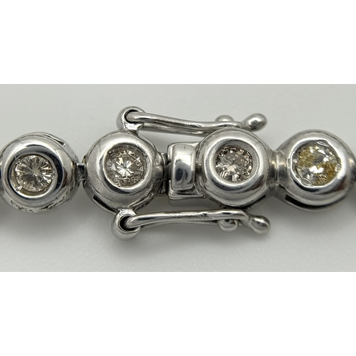 839 - A STUNNING 18K WHITE GOLD DIAMOND TENNIS BRACELET. DIAMOND WEIGHT 2CT. TOTAL WEIGHT 14.7G. TOTAL LEN... 