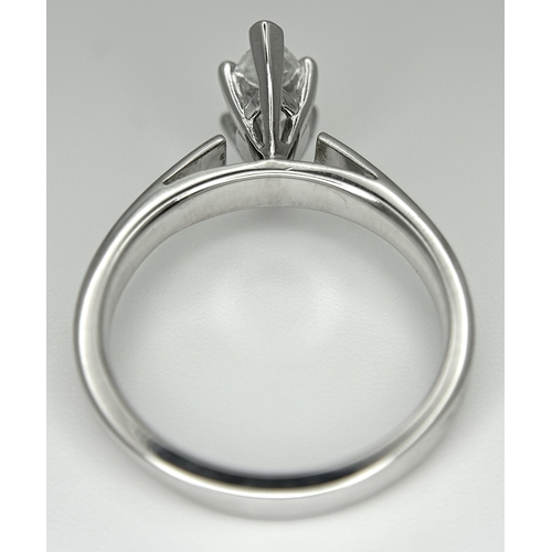 853 - A 14K WHITE GOLD MARQUISE CUT DIAMOND SOLITAIRE RING. DIAMOND WEIGHT 1.06C. TOTAL WEIGHT 4.6G. SIZE ... 