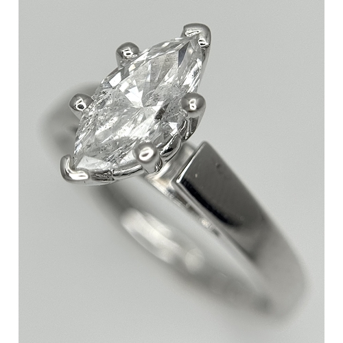 853 - A 14K WHITE GOLD MARQUISE CUT DIAMOND SOLITAIRE RING. DIAMOND WEIGHT 1.06C. TOTAL WEIGHT 4.6G. SIZE ... 