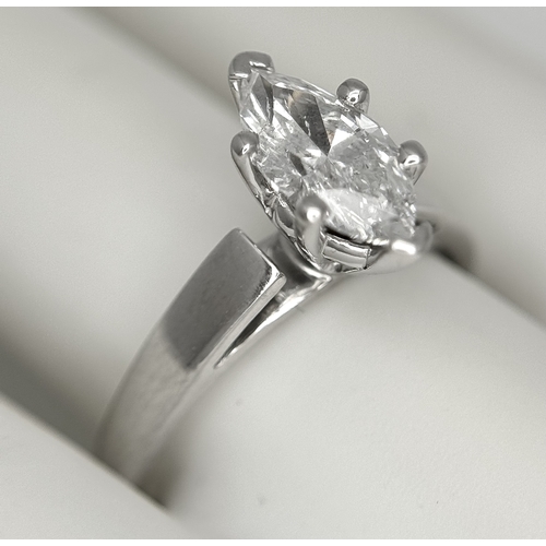 853 - A 14K WHITE GOLD MARQUISE CUT DIAMOND SOLITAIRE RING. DIAMOND WEIGHT 1.06C. TOTAL WEIGHT 4.6G. SIZE ... 