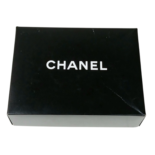 601 - A Chanel Black Patent Leather Classic Double Flap Bag.Black leather exterior with silver-toned hard... 