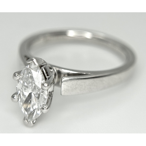 853 - A 14K WHITE GOLD MARQUISE CUT DIAMOND SOLITAIRE RING. DIAMOND WEIGHT 1.06C. TOTAL WEIGHT 4.6G. SIZE ... 