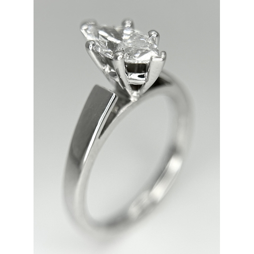 853 - A 14K WHITE GOLD MARQUISE CUT DIAMOND SOLITAIRE RING. DIAMOND WEIGHT 1.06C. TOTAL WEIGHT 4.6G. SIZE ... 