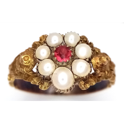 146 - A VICTORIAN MOURNING RING WITH CAPSULE FOR PHOTO OR LOCK OF HAIR , A CENTRAL PINK RUBY SURROUNDED BY... 
