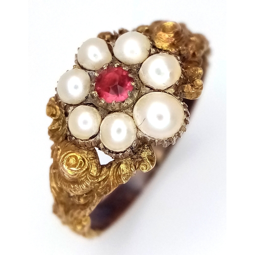 146 - A VICTORIAN MOURNING RING WITH CAPSULE FOR PHOTO OR LOCK OF HAIR , A CENTRAL PINK RUBY SURROUNDED BY... 