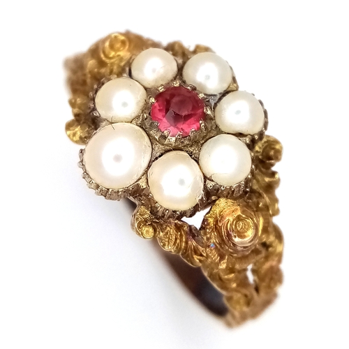 146 - A VICTORIAN MOURNING RING WITH CAPSULE FOR PHOTO OR LOCK OF HAIR , A CENTRAL PINK RUBY SURROUNDED BY... 
