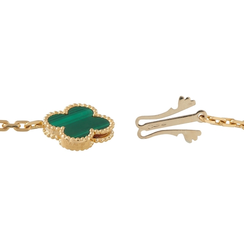 259 - A Van Cleef & Arpels Magic Alhambra 18K Yellow Gold Malachite 16 Motif Necklace.  On this 16-Motif d... 