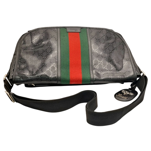 987 - A Gucci x Fiat 500 Black GG Monogram Messenger Bag. Black textile exterior with red and green web st... 