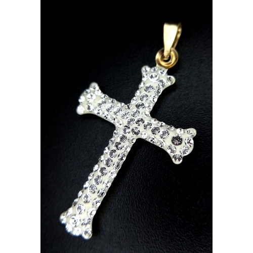 654 - A 9K Yellow Gold (tests as) White Stone Cross Pendant. 3.5cm. 0.6g.