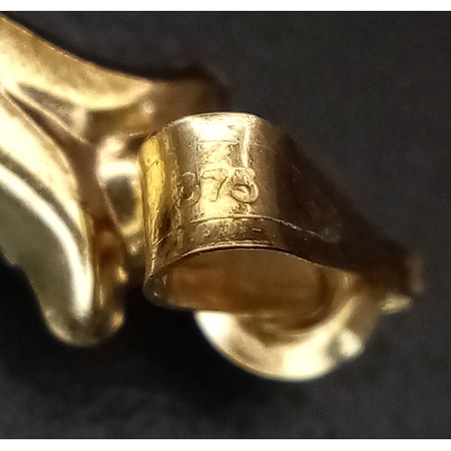 654 - A 9K Yellow Gold (tests as) White Stone Cross Pendant. 3.5cm. 0.6g.