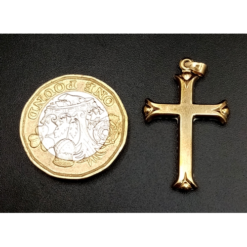 654 - A 9K Yellow Gold (tests as) White Stone Cross Pendant. 3.5cm. 0.6g.