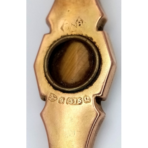 765 - An Antique 9K Yellow Diamond Brooch. Pin has been replaced. 4cm. 2.2g total weight.