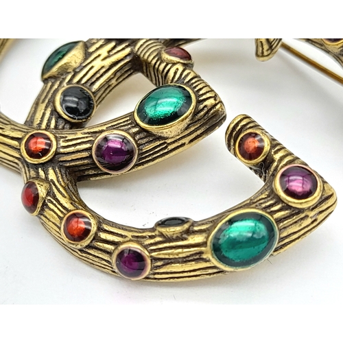 878 - A vintage Gucci stone set dress brooch. 5 X 4 cm.