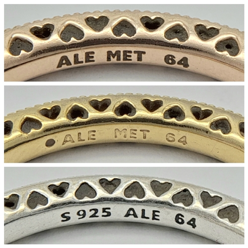 906 - A collection of 3 Pandora tri color gilded silver stone set rings. Total weight 6.7G. Sizes: 2 V and... 