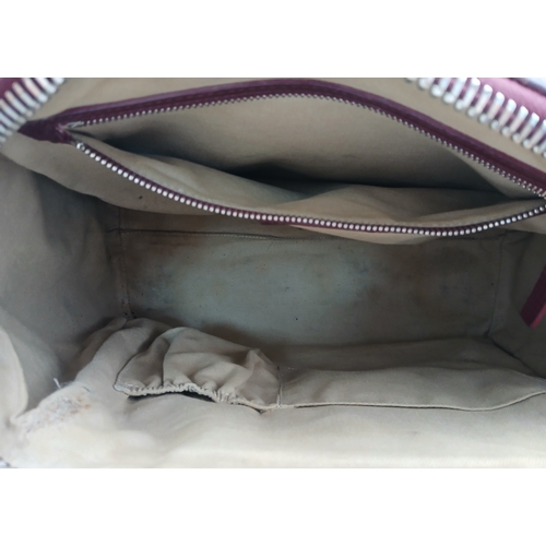 994 - A Givenchy Medium Antigona Tote Bag. Burgundy grained leather exterior with silver-toned hardware, t... 