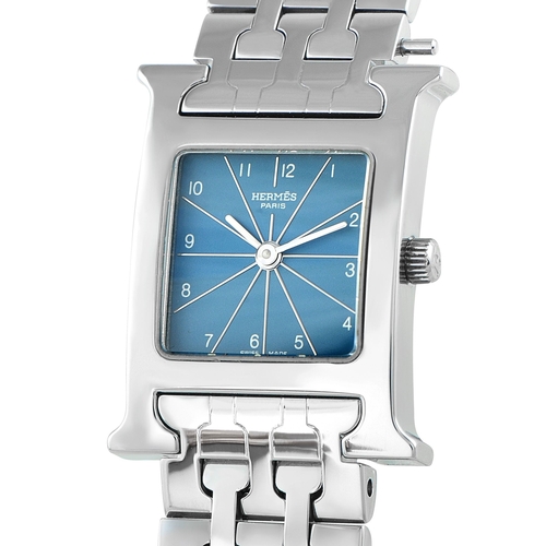 833 - An Hermes Heure H Blue Dial Steel Watch. ref. HH1.210, H-shaped stainless steel case equipped with a... 