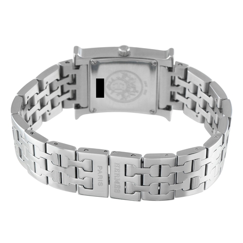 833 - An Hermes Heure H Blue Dial Steel Watch. ref. HH1.210, H-shaped stainless steel case equipped with a... 