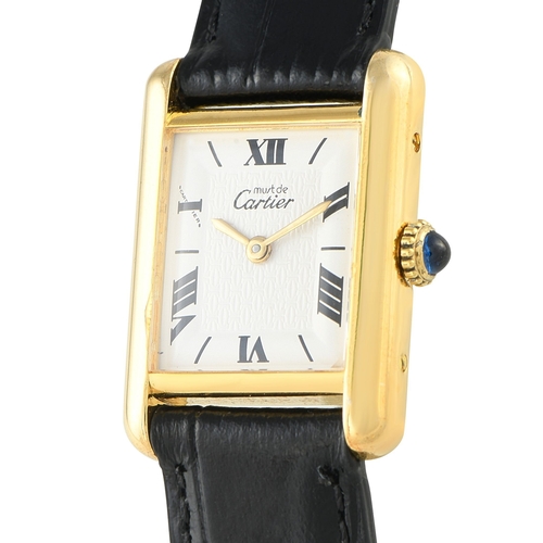 955 - A Cartier Must de Cartier Tank Logo Dial Vermeil Watch. Gold-plated sterling silver case that frames... 