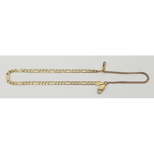 564 - A 9K Yellow Gold Figaro Link Bracelet with safety chain. 18cm. 3.3g