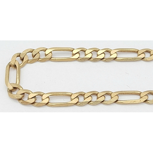 564 - A 9K Yellow Gold Figaro Link Bracelet with safety chain. 18cm. 3.3g