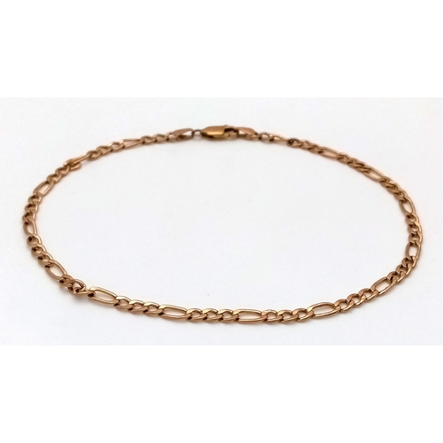 590 - A 9K Yellow Gold Figaro Link Bracelet. 24cm. 2g.