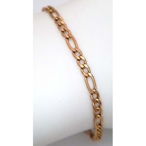590 - A 9K Yellow Gold Figaro Link Bracelet. 24cm. 2g.