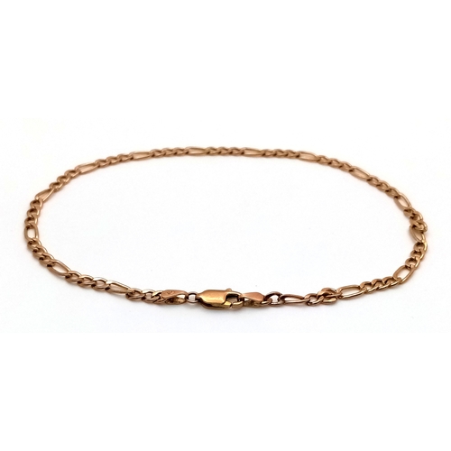590 - A 9K Yellow Gold Figaro Link Bracelet. 24cm. 2g.