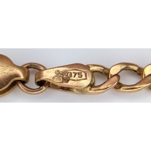 590 - A 9K Yellow Gold Figaro Link Bracelet. 24cm. 2g.