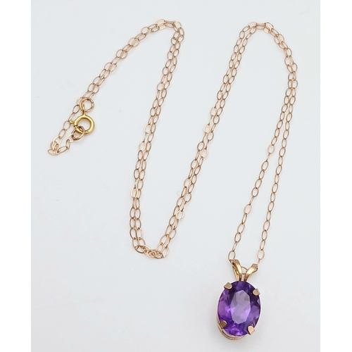 618 - A 9K Gold Amethyst Pendant on a 9K Yellow Gold Disappearing Necklace. 15mm and 42cm. 1g total weight... 