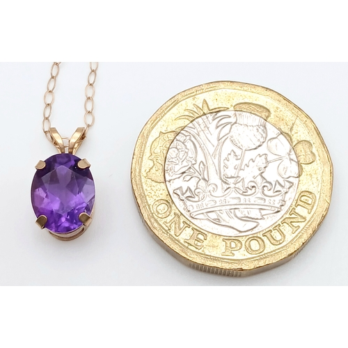 618 - A 9K Gold Amethyst Pendant on a 9K Yellow Gold Disappearing Necklace. 15mm and 42cm. 1g total weight... 