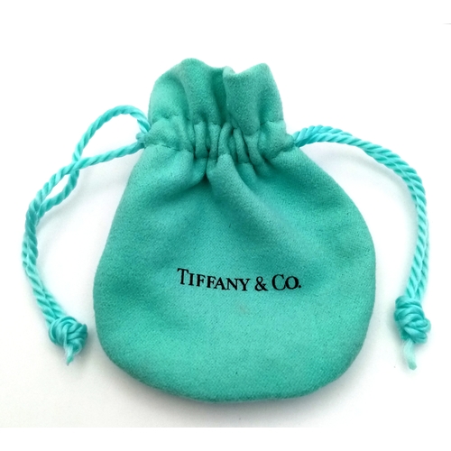 843 - A pair of Tiffany & Co 925 silver bean earrings. Total weight 3.1G. Comes with the dust cover bag.