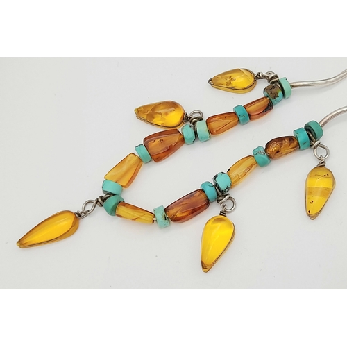 850 - An unique 925 silver Turquoise and Amber colour bead necklace. Total weight 11G. Total length 44cm.