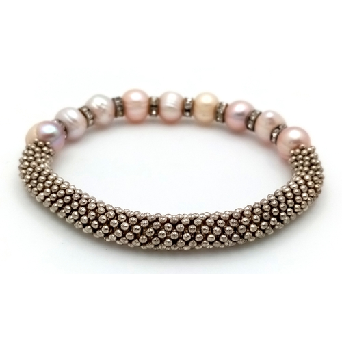 913 - A Pearl and stone set adjustable bracelet. Please see photos for details.