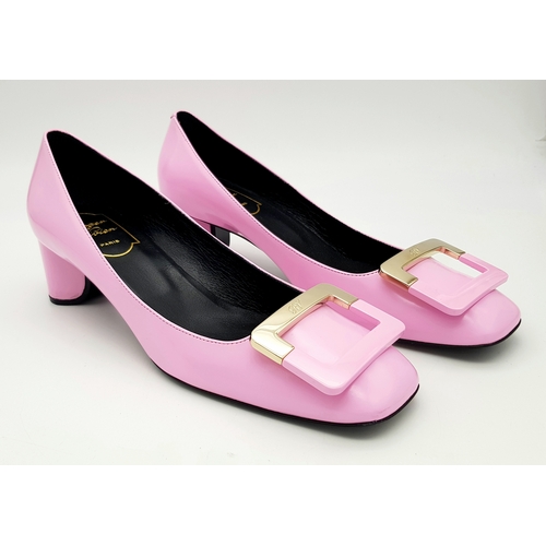 896 - A pair of Roger Vivier Belle Vivier Patent Leather Pumps in pink, featuring gold-tone buckle accents... 