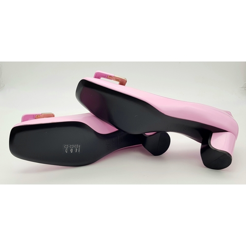 896 - A pair of Roger Vivier Belle Vivier Patent Leather Pumps in pink, featuring gold-tone buckle accents... 