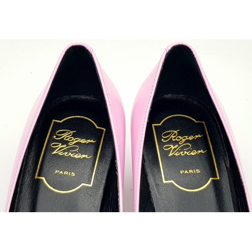 896 - A pair of Roger Vivier Belle Vivier Patent Leather Pumps in pink, featuring gold-tone buckle accents... 