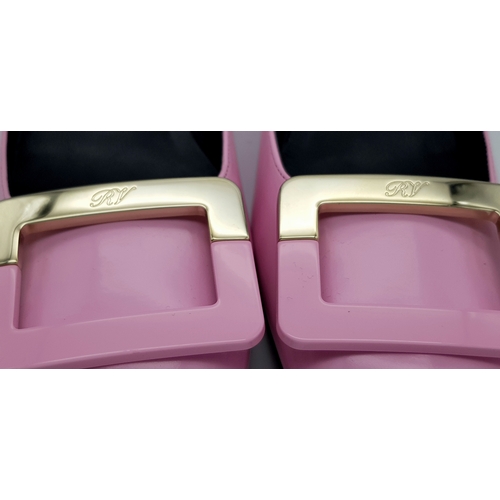 896 - A pair of Roger Vivier Belle Vivier Patent Leather Pumps in pink, featuring gold-tone buckle accents... 