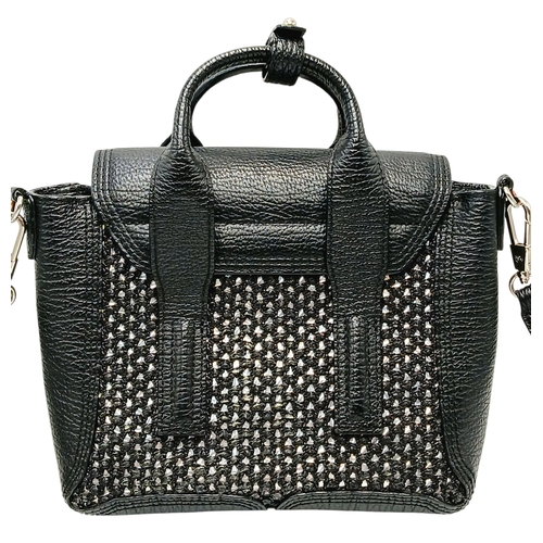 924 - A Phillip Lim black woven straw and leather medium Pashli Satchel. Silver hardware and front flap. T... 